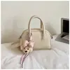 Bolso de Mano Minimalista Boston 2026 Modelo Nuevo Bolso de Bowling de Gama Alta Versátil de Nicho Bolso Cuadrado Pequeño Bolso Cruzado
