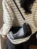 Bolso de moda de un solo hombro tipo dumpling para mujer de este año, nuevo bolso bandolera de sillín retro texturizado estilo coreano 2026, transfronterizo