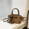Bolso pequeño elegante de alto valor para mujer 2026 Primavera Nuevo Estilo Coreano Bolso Cruzado Bolso de Mano Exquisito Tipo Cubo Bolso Pequeño para Llevar