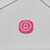 Dopamina Cara Sonriente Accesorios para Joyería DIY Venta al por Mayor Funda para Teléfono Celular Zapatos con Agujeros Pasador Calcetines Paquete de Materiales de Etiqueta de Cuero Parche