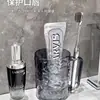Copo de enxaguante bucal com efeito de ondulação d'água, transparente, luxo leve, copo de escova de dentes doméstico, copo de lavagem para casal com alça, copo dental de alto valor estético