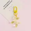 Llavero de Perro Globo Colorido Colgante de Dibujos Animados Creativo Corazón Femenino Accesorio para Bolso Resina Linda Pequeño Regalo Venta al por Mayor