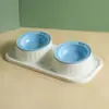 Comedero doble de cerámica para gatos transfronterizo, comedero para mascotas antiderrames, comedero integrado de agua y comida para perros, protección del cuello, fácil de limpiar, comedero con forma de OVNI