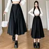 Nueva falda de cuero de cintura alta para otoño e invierno con vuelo amplio, falda plisada de longitud media que cubre las caderas para mujer