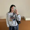 Top estilo europeo blanco-gris primavera y otoño nuevo cuello redondo nuevo sudadera con capucha suelto adelgazante versión coreana diseño petite sentido superior