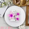 Set de tres horquillas para el pelo de flor de huevo transfronterizo con juego de cartón, clip para la parte trasera de la cabeza de flor de bauhinia, elegantes accesorios para el pelo