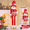 Decorações de Natal Transfronteiriças 2027 Figuras Vermelhas Telescópicas Papai Noel Boneco de Neve Rena Bonecas de Pernas Longas