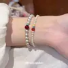 Novo bracelete de pérolas com contas requintado estilo chinês, pulseira de pulso com design de nicho de luxo leve, acessório de mão versátil para o dia a dia atacado