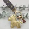 Llavero Colgante de Oro Puro 999 Año Nuevo del Caballo con Corazón, Paz y Alegría, Artículo Promocional para Transmisión en Vivo al por Mayor
