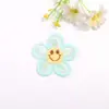 Venda quente 5,5 cm rosto sorridente flor de cinco pétalas adesivos de tecido acessórios para grampo de cabelo diy acessórios para roupas bordado peça de flor pequena adesivos de tecido