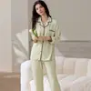 Conjunto de pijama e roupa de casa feminina de duas peças, com mangas compridas e calças compridas, em algodão puro, dupla face, costela 40 fios, 200 gramas, em estoque, pode ser usado fora de casa