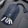 Couro Preto Multifuncional Porta-Chaves de Carro Chave de Travamento Universal Bolsa para Chaves Unissex Bolsa de Couro Bovino Retrátil para Chaves