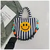 Bolso de hombro de lona casual, bolso de mano a rayas con cara sonriente, bolso cruzado, bolso para tutorías de estudiante, bolso lindo y artístico