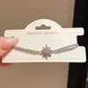 Pulsera de Brazalete con Colgante de Estrella de Circonita Super Brillante Cruzada Pulsera de Personalidad de Gama Alta de Nicho Diseño Retro Sentido Joyería de Mano Venta al por Mayor
