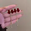 Pendientes de Perlas con Lazo Rojo para Otoño e Invierno Pendientes de Alta Gama para Mujer 2025 Nuevo Estilo Chino Pendientes Rojos