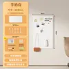 El tablero perforado de metal engrosado de IKEA se puede fijar magnéticamente a la pared, sirviendo como un estante de almacenamiento sin borde y se puede fijar magnéticamente