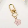 Chaveiro de Flor de Cerejeira Doce e Colorido Estilo Coreano Simples Ins Alto Valor Pingente Floral Fresco para Mochila