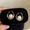 Elegante HerederaEstilo Fresco Bolso de Lunares Plateados Arete Arete Único Mujer 2026 Aretes Súper Hermosos
