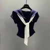 Conjunto Completo Estilo Coreano de Terno Esportivo Casual com Gola Marinho para Mulheres Férias de Verão Conjunto de Duas Peças Xale + Saia Curta Conjunto de Duas Peças Ins