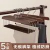 Perchas de ropa al por mayor: Perchas de madera maciza con superficie aterciopelada para pantalones para uso doméstico, antideslizantes y que no marcan la ropa, específicamente para jeans, con la opción de añadir un logotipo