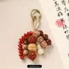 Nuevo colgante de bolsa de cuentas de semillas que cumple deseos estilo chino, llavero de Bodhi natural tejido a mano, decoración artística retro para bolsa