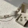Diseño Otoño e Invierno Copo de Nieve Perlado Collar Gargantilla de Felpa Accesorios de Collar Elegantes de Nicho para Mujer