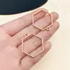 Marco abrasivo de gota de pegamento con figura geométrica de gota de agua de amor hueca de cuatro colores, accesorios de joyería de aleación DIY al por mayor