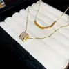 Collar de Zirconia Doble Capa Electrochapado en Oro Real de 18K Nuevo Estilo 2026 Cadena para Clavícula Elegante Versátil Cadena para el Cuello de Lujo Ligero Alta Gama