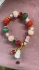 Nuevo estilo chino pulsera de calabaza de seda dorada estilo chino retro alta sensación calabaza lucky diseño de nicho pulsera versátil