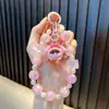 Cadena para Teléfono Móvil con Muñeca de Cuentas Llavero Colgante Lindo para Bolso Llavero de Coche Pulsera Regalos Pequeños para Parejas Venta al por Mayor