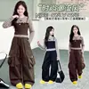 Conjunto de otoño para niñas 2026 nuevo modelo conjunto de dos piezas de imitación con top de retazos a rayas y pantalones cargo para niños venta al por mayor