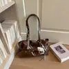 Elegante Bolso Xiaomi Retro de Nicho de Gran Capacidad para Mujer Otoño 2026 Nuevo Bolso de Hombro Individual Casual de Nicho Bolso de Axila para Viajes