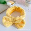 Faixa de cabelo com laço de cor sólida da Coreia do Sul Faixa de cabelo lavável para mulheres Faixa de cabelo de flanela lavável Acessórios para cabelo Atacado de fábrica de chapéus