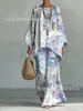 Nuevo conjunto de dos piezas para mujer: camiseta casual de moda con estampado transfronterizo, cuello redondo, manga larga + pantalones de campana