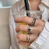 Estilo coreano estilo coreano moda retro amor antiguo letras inglesas anillo hueco sensación de diseño de alto nivel viento frío disco