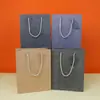 Sacola de presente sacola de presente corporativo bolsa de mão sacola de papel sacola de presente de aniversário sacola de loja de roupas espessa