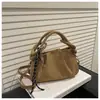 Elegante bolso de mano plisado, nuevo y versátil, popular, retro, simple, tipo bolita, bolso de nicho moderno para hombro y cruzado