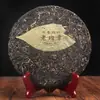Venta al por mayor té Pu'er guiyuanchang antiguo Banzhang pastel crudo té de árbol antiguo 357G árbol antiguo material puro té crudo pu'er