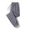 Pantalones deportivos para hombre Primavera Nuevo talla grande holgados pantalones de chándal tobilleros tejido de punto moda moderno cremallera camuflaje pantalones casuales