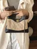 Bolso transfronterizo Yozhi estilo pequeño Chanel, nueva colección 2026, bolso de hombro patchwork de gamuza, exquisito bolso cruzado tipo sobre con cadena