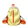 Mochila pequeña nueva de estilo minimalista suave de alta gama de color sólido para estudiantes universitarios que salen de viaje mochila casual ligera para mujeres