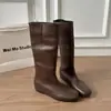 Botas francesas minimalistas de cano alto 2026 novo estilo botas de montaria de sola reta bico quadrado para mulheres, botas elásticas de ajuste slim