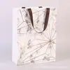 Bolsas de Papel sin Cintura con Diseño Geométrico del Fabricante, Bolsas de Compra de Regalo de Boutique de Alta Gama, En Stock al por Mayor