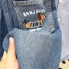 Jeans de dibujos animados con bolsillo trasero para primavera y otoño para niños 2025 Nuevos pantalones de mezclilla Jeans azules para niños Ropa para niños