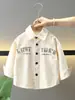 0964 Camisa de Primavera y Otoño para Niños 2026 Nuevo Estilo Camisa de Manga Larga con Cuello Campana para Bebé Chaqueta Casual de Pequeño Caballero