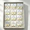 Pendientes hidráulicos versátiles de estilo simple de acero inoxidable de alta calidad, superventas europeos y americanos, galvanizado con oro real de 18 quilates, ventas directas de fábrica