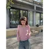 Procesamiento OEM 100% hilo Yangzi alemán suéter de punto de color liso minimalista de corte ajustado versátil con media botonadura y cuello Polo para mujer