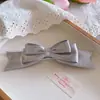 Horquilla de lazo para mujer, parte posterior de la cabeza, clip de resorte, coleta alta, bobina de temperamento plateado, pinza para el cabello de gran sentido, tocado