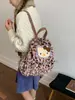Mochila Peluda Estilo Dulce y Femenino para Mujer 2025 Nueva Mochila Escolar de Leopardo Peludo Versátil Ligera Otoño e Invierno