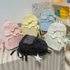 Mochila casual de moda, de nicho, de alto estilo para el día a día con un lindo moño, mochila rosa estilo coreano